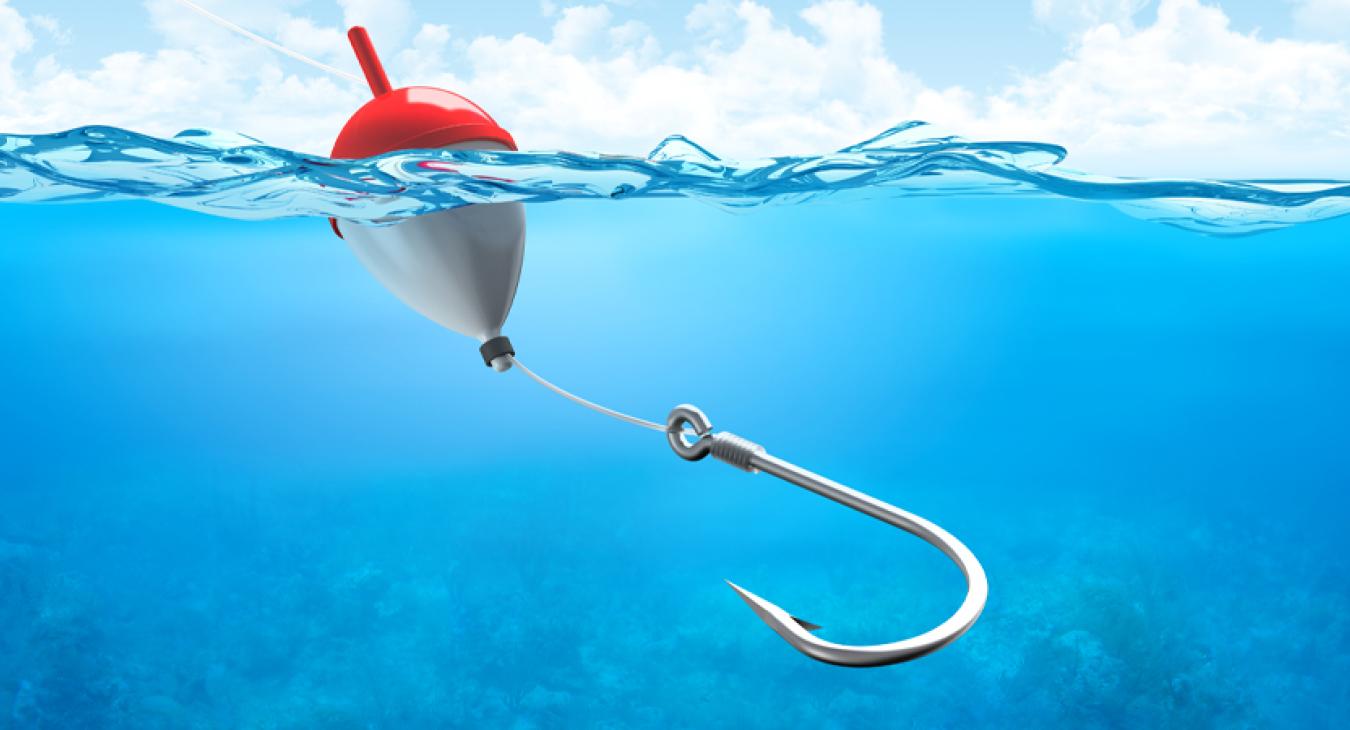 A fishing hook floats in a body of water